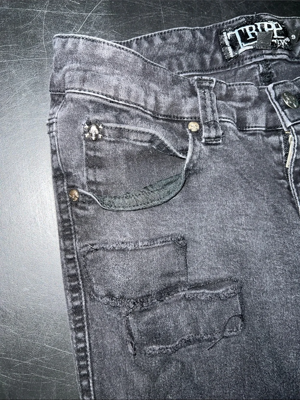 Tripp NYC Black Skinny Jeans with White Skull Patch